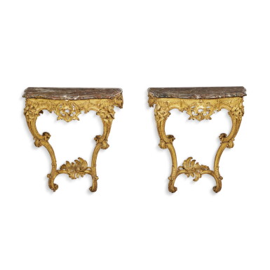 View full screen - View 1 of Lot 46. A Pair of Louis XV Carved Giltwood Console Tables, Mid-18th Century.