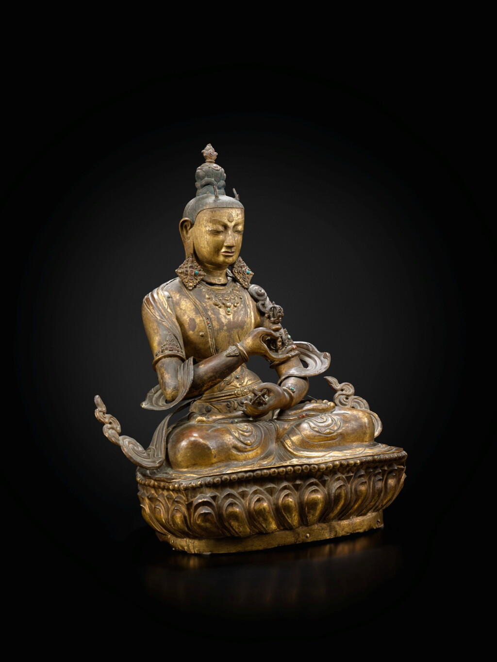 View full screen - View 1 of Lot 18. A large gilt copper repoussé and gilt copper alloy figure of Vajrasattva Tibet, 18th century | 西藏 十八世紀 鎏金銅合金金剛薩埵坐像.
