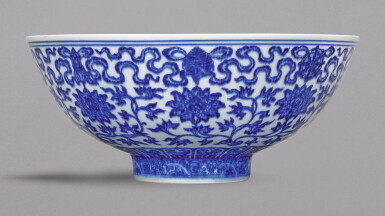 View full screen - View 1 of Lot 19. A LARGE BLUE AND WHITE 'BAJIXIANG' BOWL, YONGZHENG MARK AND PERIOD | 清雍正 青花纏枝番蓮托八吉祥紋大盌 《大清雍正年製》款.