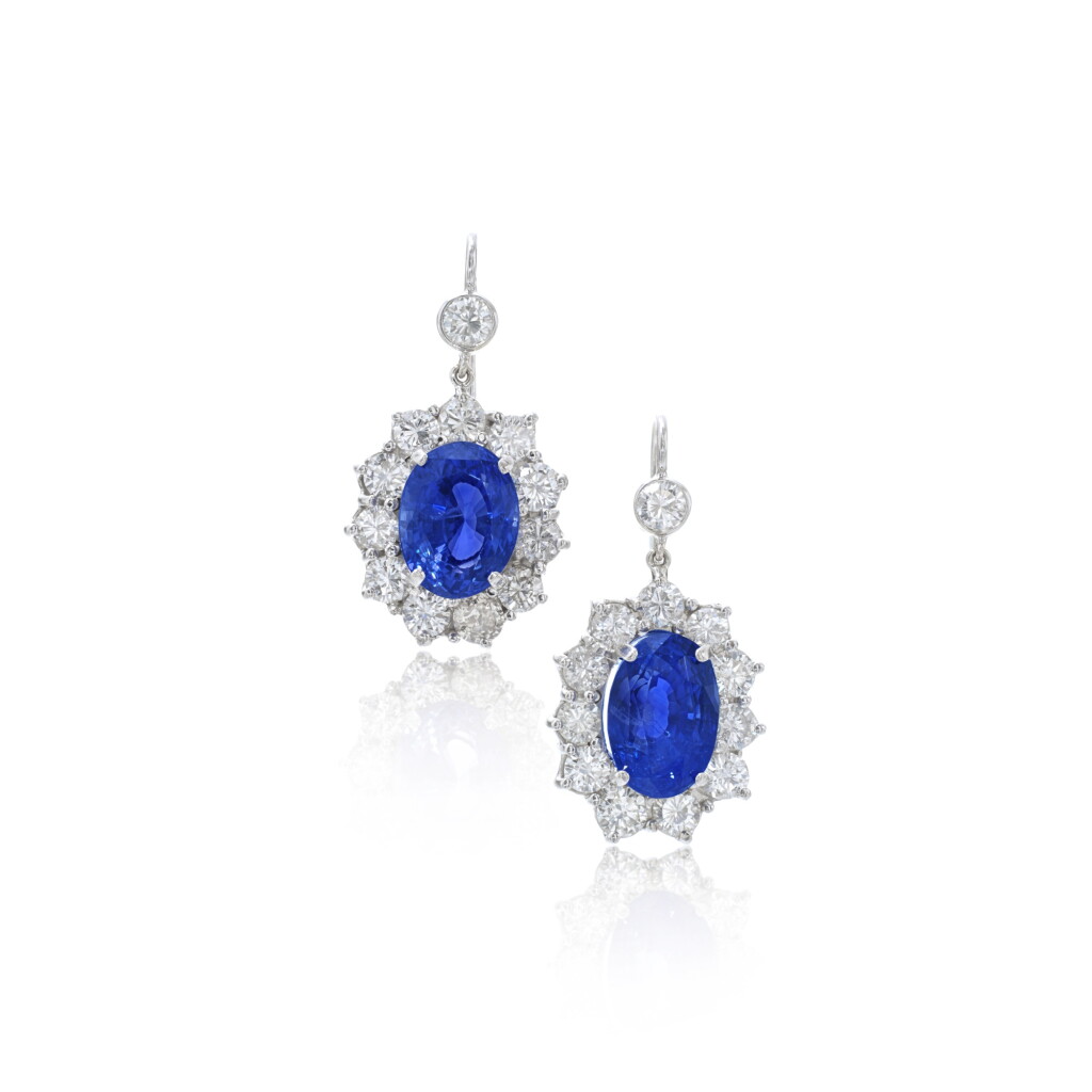 View full screen - View 1 of Lot 902. Pair of sapphire and diamond pendent earrings.