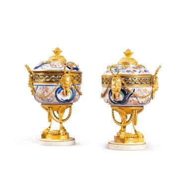 View full screen - View 1 of Lot 574. A pair of gilt-bronze mounted Japanese Imari porcelain pot-pourri vases, the porcelain probably late 17th century, the mounts Louis XVI, circa 1780.