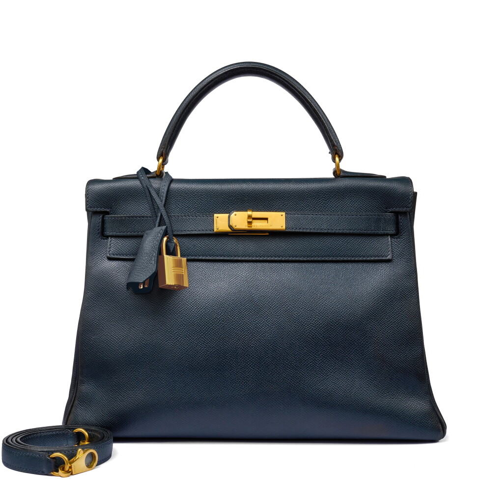 View full screen - View 1 of Lot 51. Vintage Black Courchevel Kelly 32 Retourné Gold Hardware, 1995.
