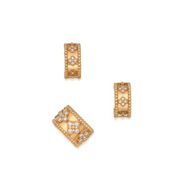 View full screen - View 1 of Lot 229. Pair of Gold and Diamond 'Perlée Clovers' Ring and Pair of Earclips, France.
