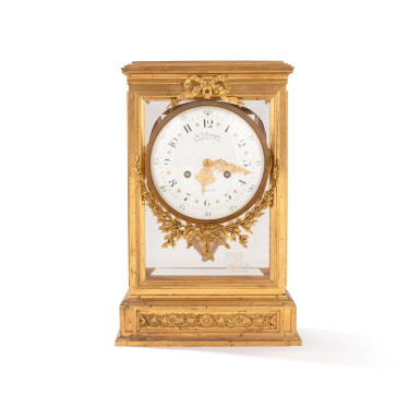 View full screen - View 1 of Lot 287. A Louis XVI style gilt-bronze mantel clock, 19th century | Pendule cage en bronze doré de style Louis XVI, XIXe siècle.