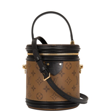 View full screen - View 1 of Lot 87. Louis Vuitton Cannes Bag of Reverse Monogram Canvas with Golden Brass Hardware.