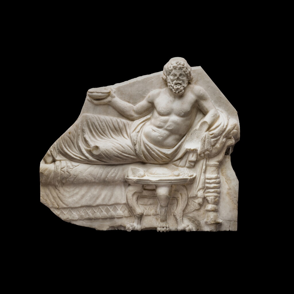 View full screen - View 1 of Lot 13. A Hellenistic Marble Votive Relief Fragment, 2nd Half of the 2nd Century B.C., with 17th Century Restorations.