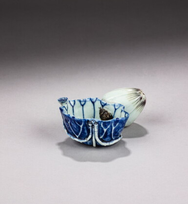 View full screen - View 1 of Lot 18. A blue and white ‘lotus’ washer and water dropper, Qing dynasty, 17th century | 清十七世紀 青花荷葉式洗水滴.