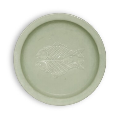 View full screen - View 1 of Lot 143. A celadon-glazed 'twin fish' dish, Seal mark and period of Qianlong | 清乾隆 粉青釉雙魚折沿盤 《大清乾隆年製》款.