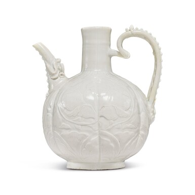 View full screen - View 1 of Lot 185. A finely carved and molded 'Ding' ewer, Northern Song dynasty | 北宋 定窰白釉牡丹紋執壺.