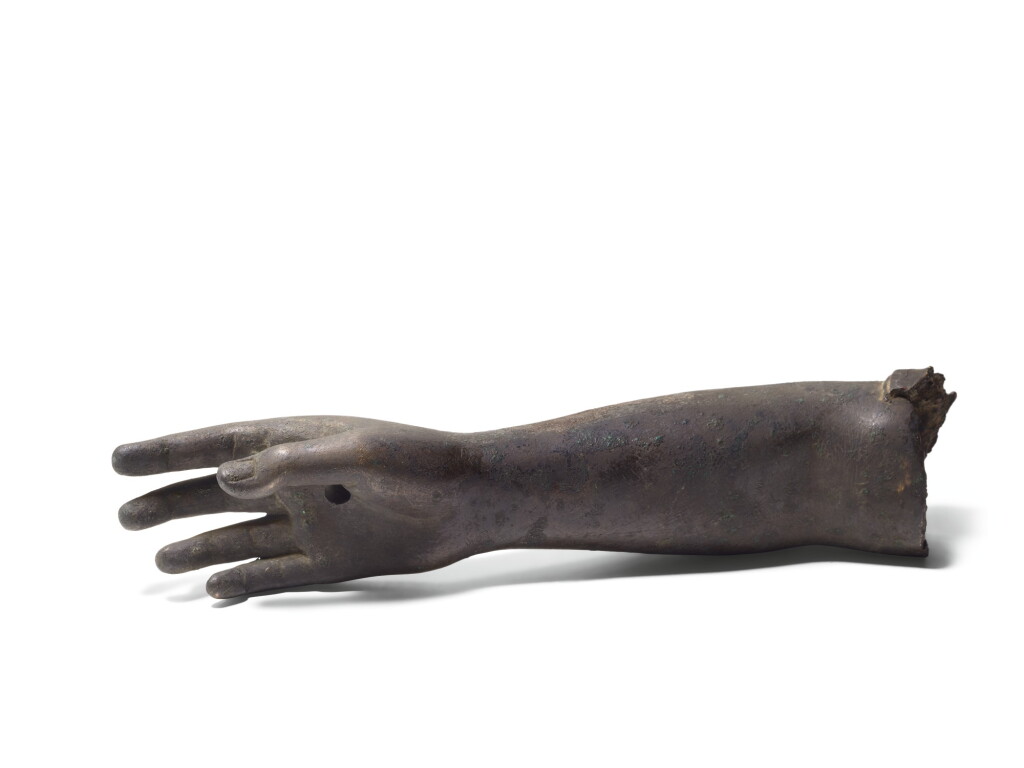 View full screen - View 1 of Lot 89. A ROMAN BRONZE RIGHT ARM, CIRCA 2ND CENTURY A.D..