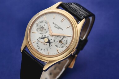 View full screen - View 1 of Lot 14. Reference 3940 A pink gold automatic perpetual calendar wristwatch with moon phases and 24-hour indication, Made in 1993.
