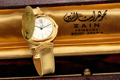 View full screen - View 1 of Lot 66. A yellow gold coin bracelet watch, Circa 1970.