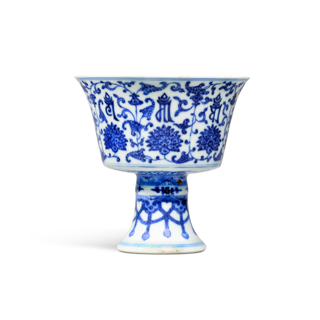 View full screen - View 1 of Lot 241. A blue and white 'lança characters' stem cup, Seal mark and period of Qianlong | 清乾隆 青花纏枝蓮梵文高足盃 《大清乾隆年製》款.