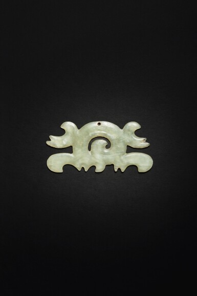 View full screen - View 1 of Lot 50. An archaic celadon jade cloud-shaped pendant, Neolithic period, Hongshan culture.