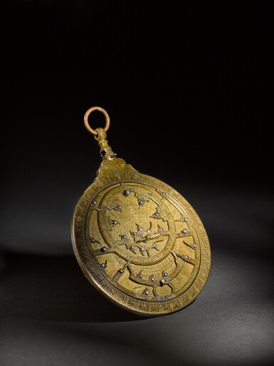 View full screen - View 1 of Lot 99. A brass astrolabe, attributable to the workshop of al-Hasan ibn Ahmad al-Battuti, Morocco, late 17th/early 18th century.