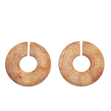 View full screen - View 1 of Lot 463. A pair of jade 'dragons' slit rings, Han dynasty 漢 龍紋玉玦一對.