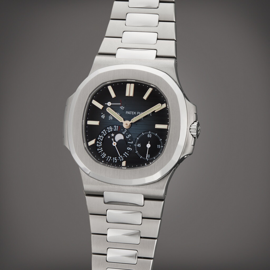 View full screen - View 1 of Lot 110. Reference 5712/1A-001 Nautilus | A stainless steel bracelet watch with date, moon phases and power reserve indication, Circa 2021 | 百達翡麗 型號 5712/1A-001 Nautilus 精鋼鍊帶腕錶備日期、月相及動力儲存顯示,製作年份約 2021.