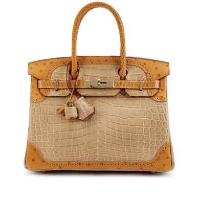 View full screen - View 1 of Lot 9806. Important Private Collection: Limited Edition Poussière Matte Niloticus Crocodile, Tabac Camel Ostrich and Sesame Lizard Grand Mariage Birkin 30 Permabrass Hardware, 2013.