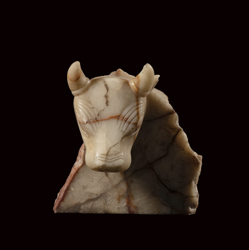View full screen - View 1 of Lot 8. A South Arabian Veined Alabaster Bull Stele Fragment, Qataban, 3rd Century B.C./1st Century A.D..