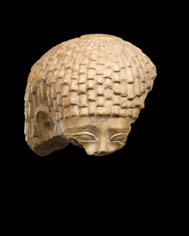 View full screen - View 1 of Lot 222. A Fragmentary Egyptian Indurated Limestone Head of a Man, 26th Dynasty, 664-525 B.C..