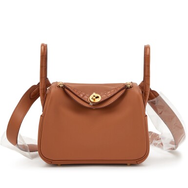 View full screen - View 1 of Lot 46. Gold Swift and Matte Alligator Touch Mini Lindy 18 Gold Hardware, 2023.