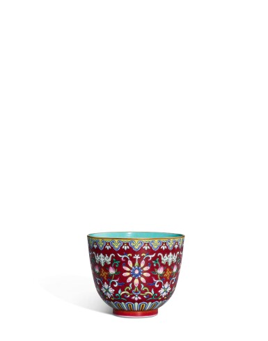 View full screen - View 1 of Lot 5109. A ruby-ground famille-rose 'lotus' cup, Seal mark and period of Jiaqing | 清嘉慶 胭脂紫地粉彩纏枝蓮紋盃 《大清嘉慶年製》款.