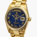 Day-Date, Reference 18038 | A yellow gold wristwatch with day, date, bracelet and blue aventurine hardstone dial | Circa 1985