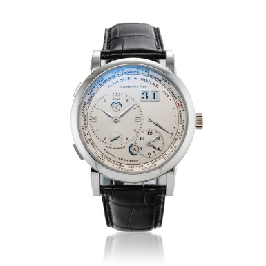 View full screen - View 1 of Lot 121. Reference 116.025 Lange 1 Zeitzone | A platinum world time wristwatch with digital date display, power reserve and day and night indication, Circa 2006 | 朗格 116.025 型號 Lange 1 Zeitzone | 鉑金世界時間腕錶備數字日期、動力儲存及晝夜顯示,約2006年製.