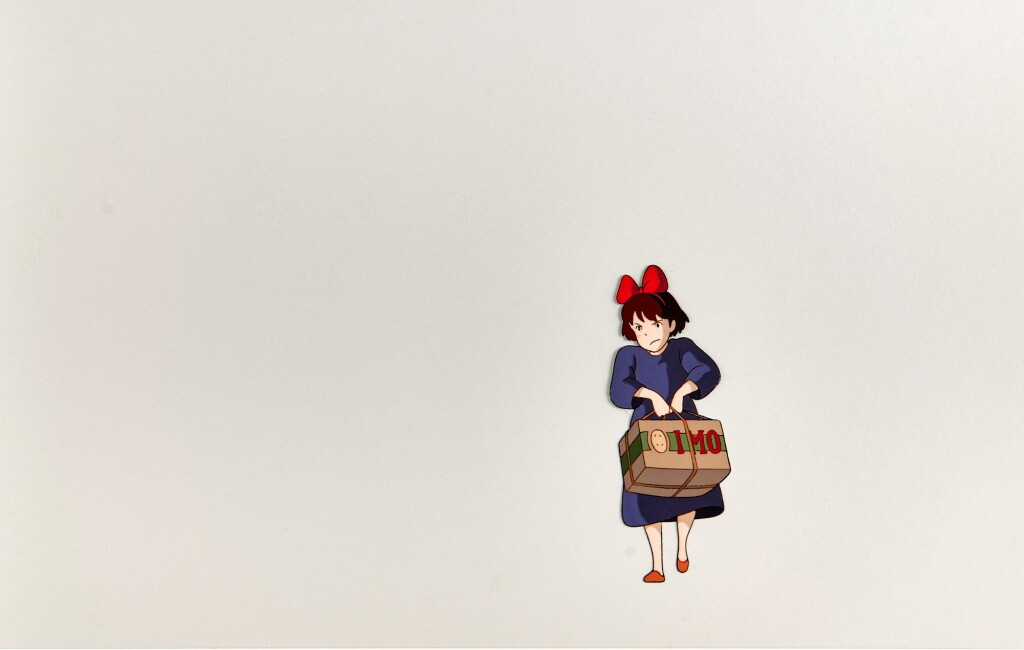 View full screen - View 1 of Lot 3. Kiki Carrying a Suitcase, Angry Looking Animation Cel | 憤怒地提行李箱的琪琪賽璐璐.