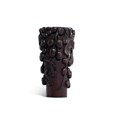 View full screen - View 1 of Lot 9599. A carved wood 'grape' incense holder, 20th century | 二十世紀 木雕葡萄紋香筒.