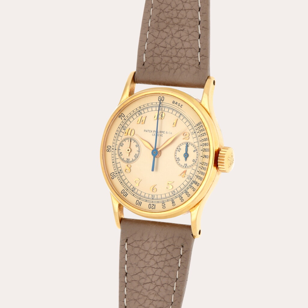 View full screen - View 1 of Lot 15. Reference 130 | A unique yellow gold mono-pusher chronograph wristwatch with Breguet numerals and champagne dial | Made in 1937.