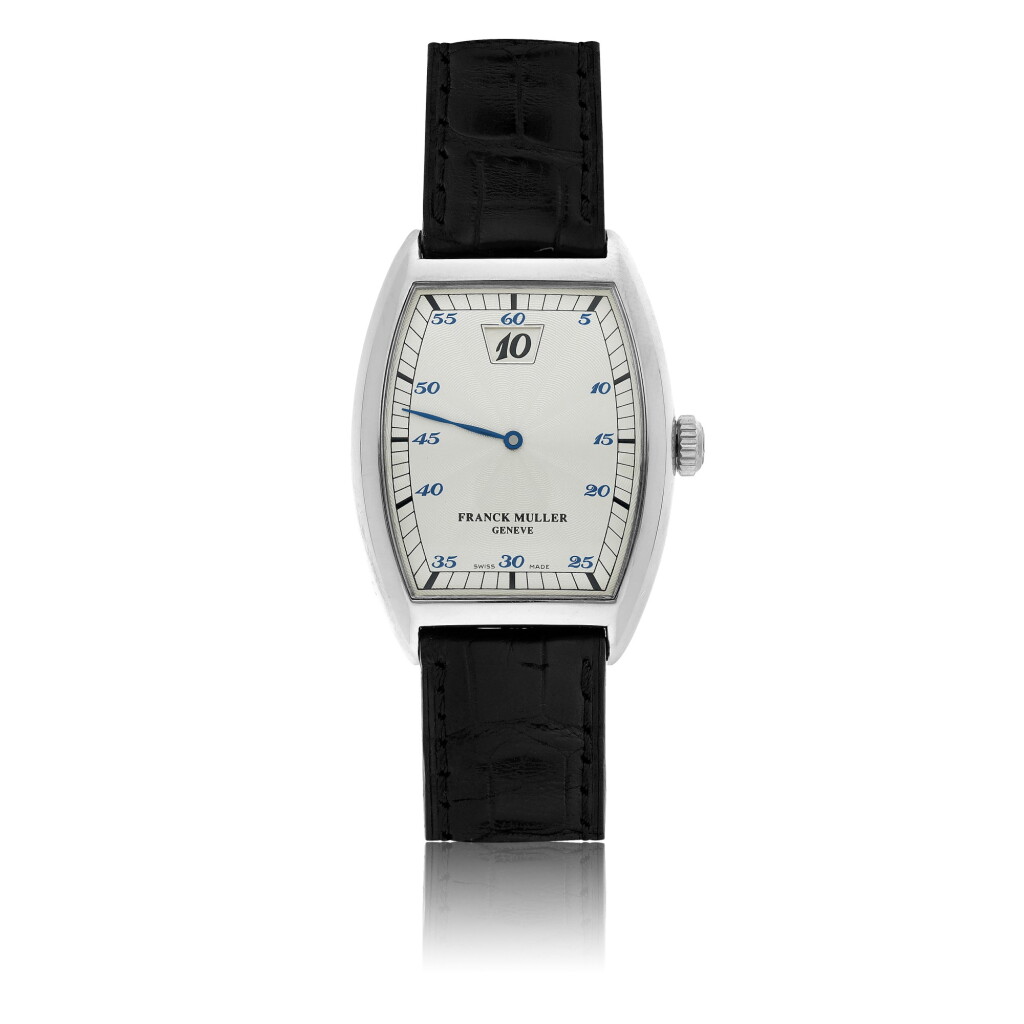 View full screen - View 1 of Lot 63. FRANCK MULLER | REF 7500 SC, A PLATINUM TONNEAU FORM JUMP HOUR WRISTWATCH CIRCA 2000.