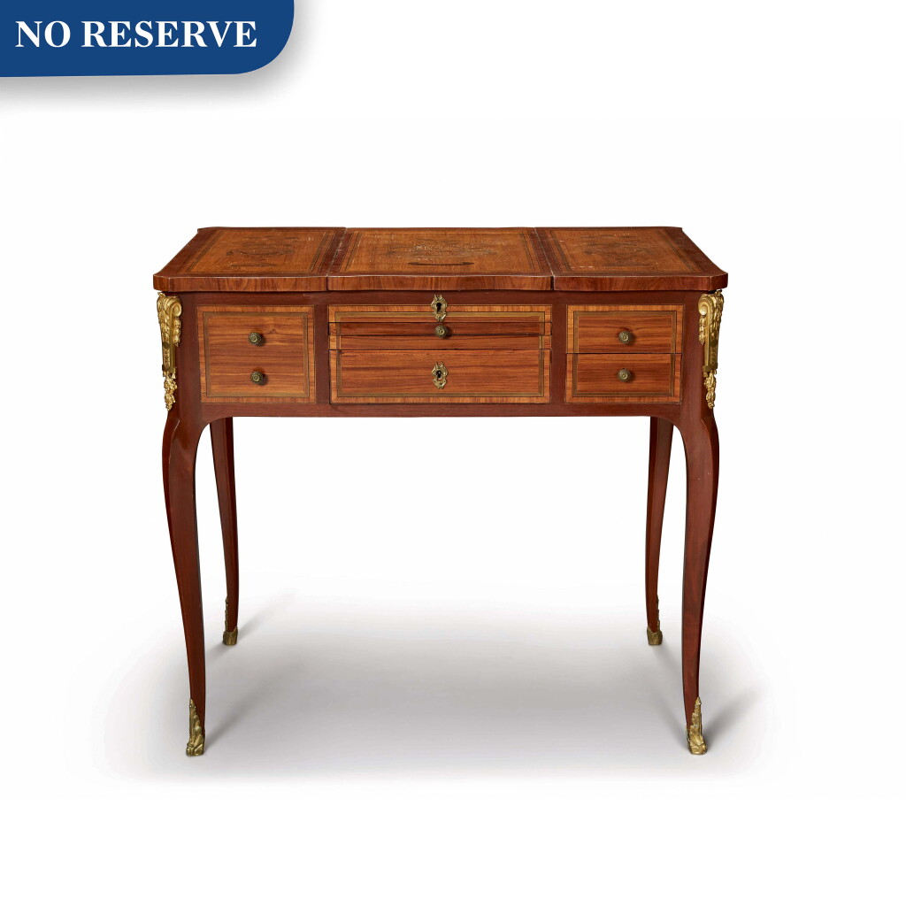 View full screen - View 1 of Lot 176. A LOUIS XV/XVI TRANSITIONAL STYLE GILT BRONZE-MOUNTED TULIPWOOD, BOIS SATINÉ AND MARQUETRY POUDREUSE.