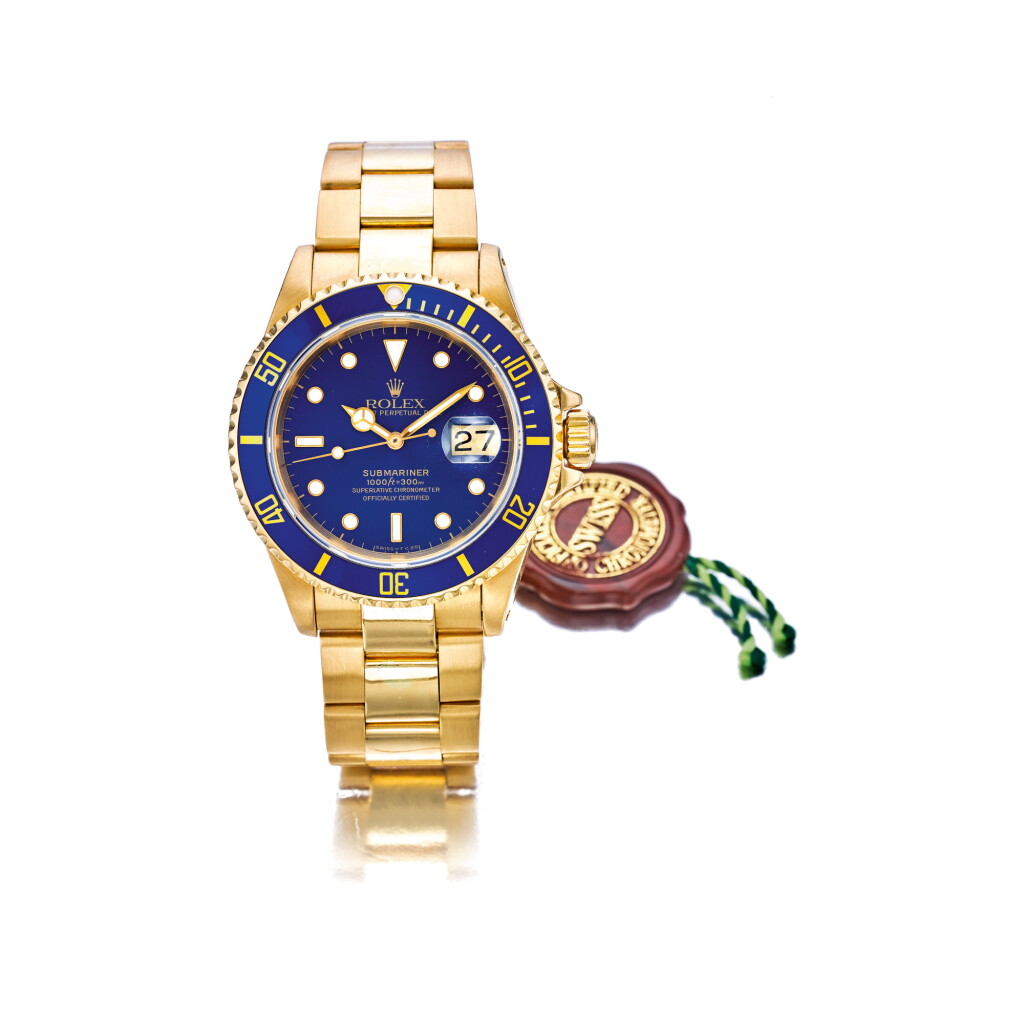View full screen - View 1 of Lot 808. ROLEX | REF 16618 SUBMARINER, A YELLOW GOLD AUTOMATIC WRISTWATCH WITH DATE AND BRACELET, CIRCA 1991 | 勞力士 | 16618型號「SUBMARINER」黃金自動上鏈鍊帶腕錶備日期顯示,年份約1991.