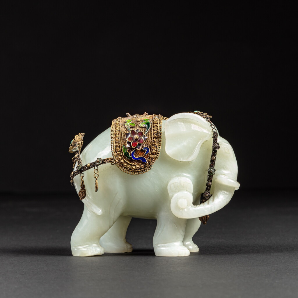 View full screen - View 1 of Lot 145. A white jade elephant, Qing dynasty.