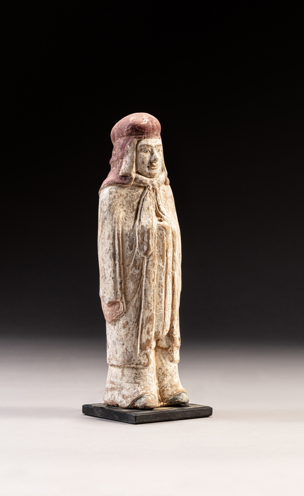 View full screen - View 1 of Lot 302. A painted pottery figure of an attendant, Northern Wei dynasty.