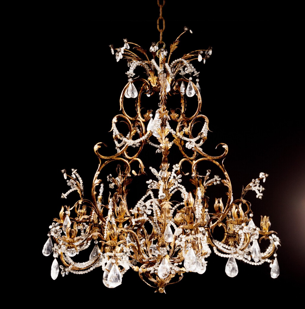 View full screen - View 1 of Lot 74. An Italian gilt-metal, tôle and rock crystal chandelier, 18th century and later | Lustre en métal doré, tôle et cristal de roche, Italie, en partie du XVIIIe siècle.