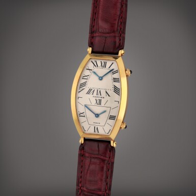 View full screen - View 1 of Lot 431. Tonneau Dual Time | A limited edition yellow gold dual time wristwatch | Circa 1991.