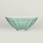 A superb carved 'Longquan' celadon-glazed 'lotus' bowl, Southern Song dynasty