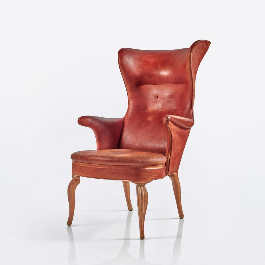 View full screen - View 1 of Lot 568. A Rare High-Back Wing Armchair.