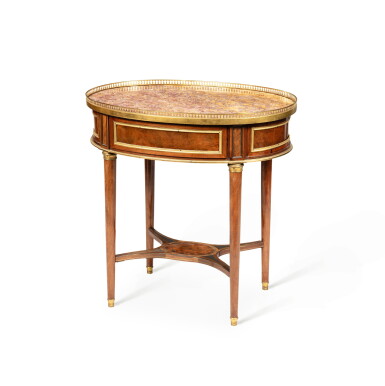 View full screen - View 1 of Lot 116. A Louis XVI gilt-bronze mounted mahogany and plumpudding mahogany veneered mecanism table, circa 1785 | Table ovale à mécanisme en acajou, placage d'acajou flammé et bronze doré d'époque Louis XVI, vers 1785.