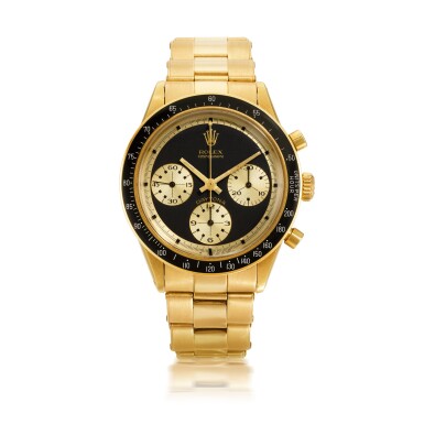 View full screen - View 1 of Lot 951. ROLEX |  COSMOGRAPH DAYTONA PAUL NEWMAN "JOHN PLAYER SPECIAL", REF 6264   AN EXTREMELY RARE AND OUTSTANDINGLY BEAUTIFUL YELLOW GOLD CHRONOGRAPH WRISTWATCH WITH BRACELET    CIRCA 1969.