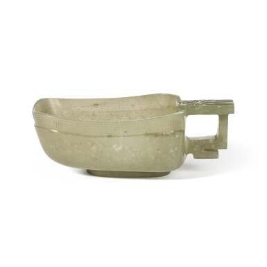 View full screen - View 1 of Lot 761. An archaistic celadon jade handled cup (Yi), 19th / 20th century | 十九 / 二十世紀 青玉雕仿古匜式盃.