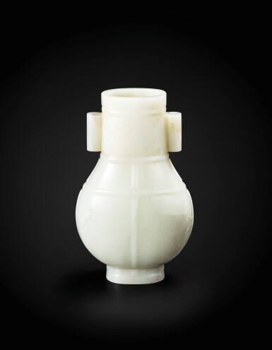 View full screen - View 1 of Lot 109. A large pale celadon jade archaistic vase Qing dynasty, 18th-19th century | 清十八至十九世紀 青白玉仿古貫耳壺.