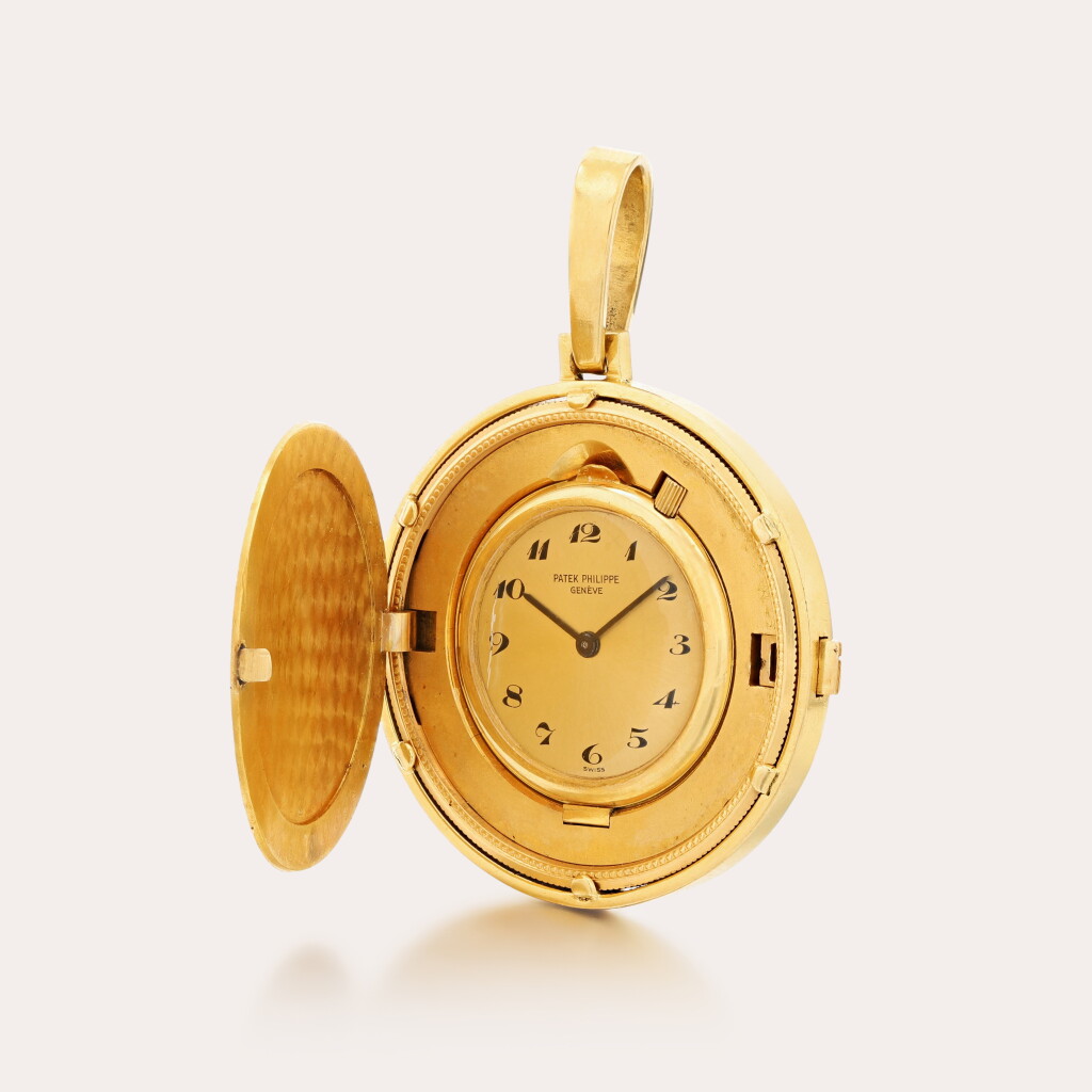 View full screen - View 1 of Lot 410. 100 Pesetas, reference 809 Montre pièce en or jaune | Yellow gold coin watch Vers 1960 | Circa 1960.