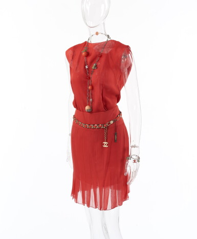 View full screen - View 1 of Lot 138. CHANEL | CORAL SILK ENSEMBLE, CHARM NECKLACE AND BRACELET AND CLASSIC CHAIN BELT .