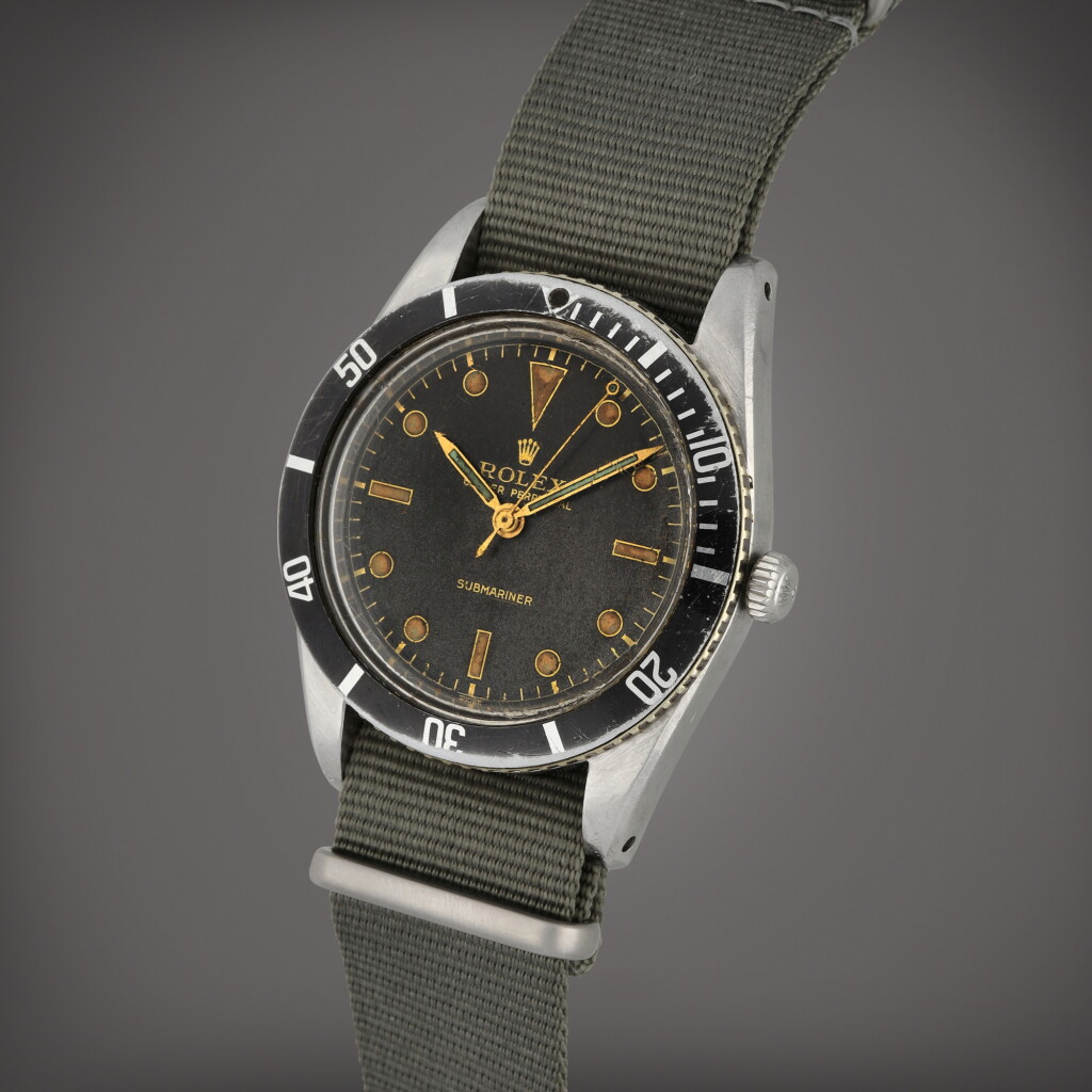 View full screen - View 1 of Lot 30. Submariner, Reference 6204 | A stainless steel wristwatch | Circa 1954.