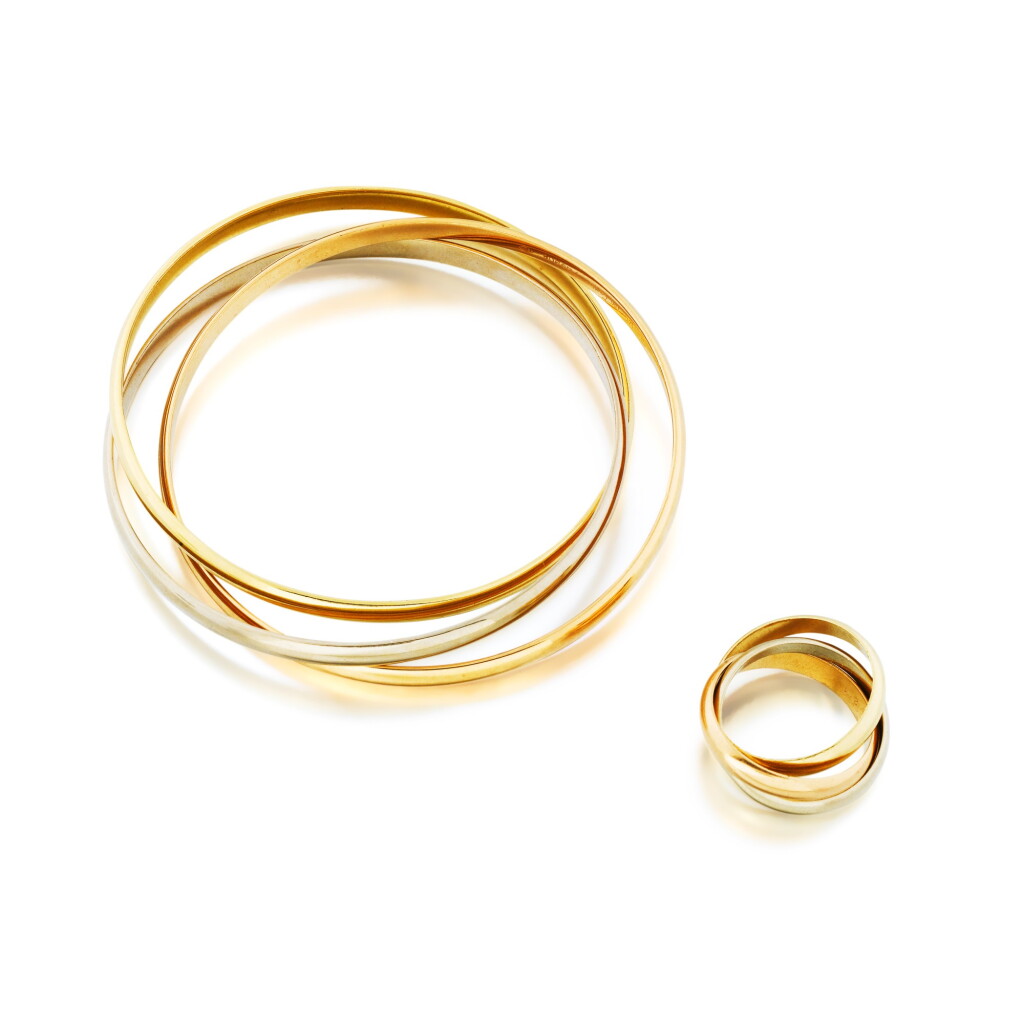 View full screen - View 1 of Lot 447. Cartier | Bracelet et bague or, "Trinity" | Bracelet and ring, 'Trinity'.