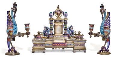 View full screen - View 1 of Lot 166. A silver-gilt and champlevé enamel desk set and a pair of two-light candelabra, Khlebnikov, Moscow, 1889.