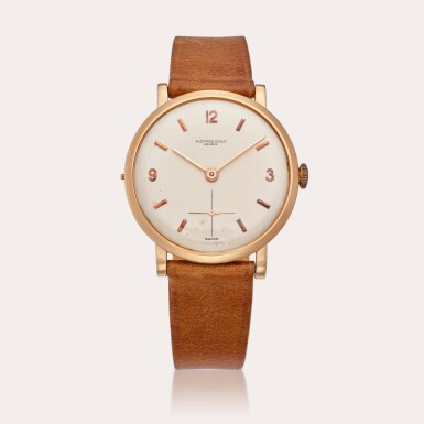 View full screen - View 1 of Lot 131. Reference 5051BA | A yellow gold wristwatch with start/stop pin for the movement, Circa 1951.